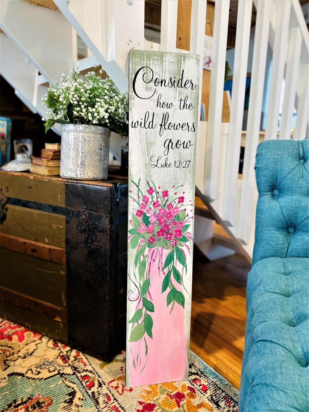 Consider how the wildflowers grow welcome sign