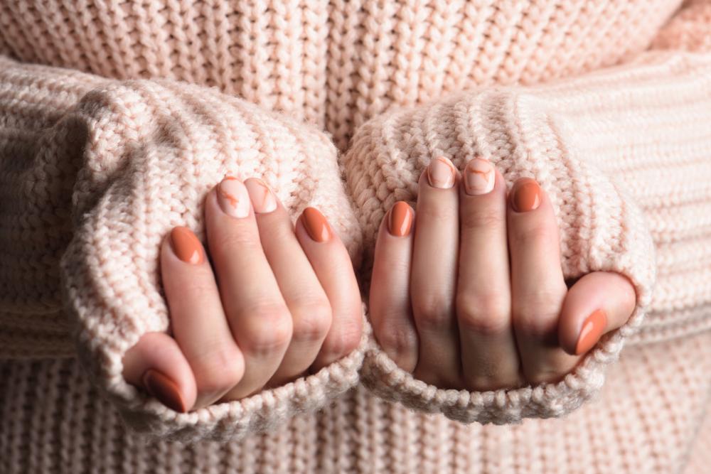 Cute nail designs marbled orange