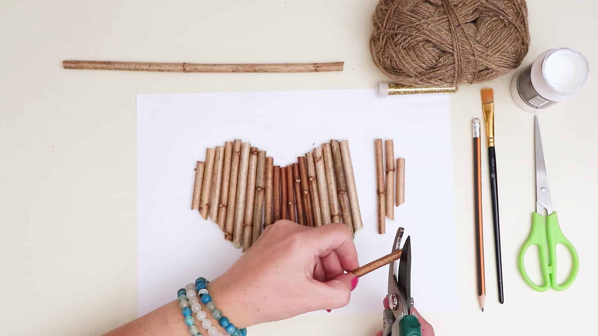 Diy hanging twig heart cutting