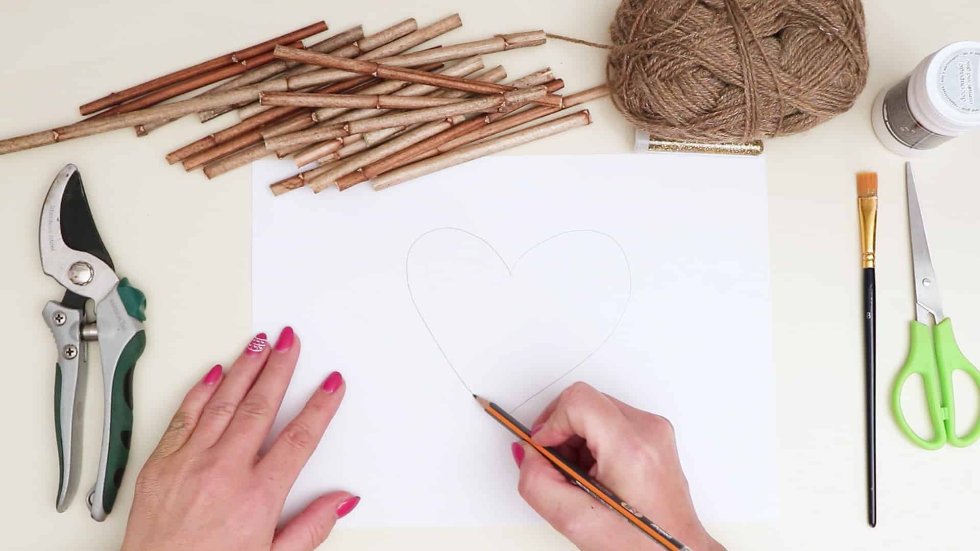Diy hanging twig heart draw