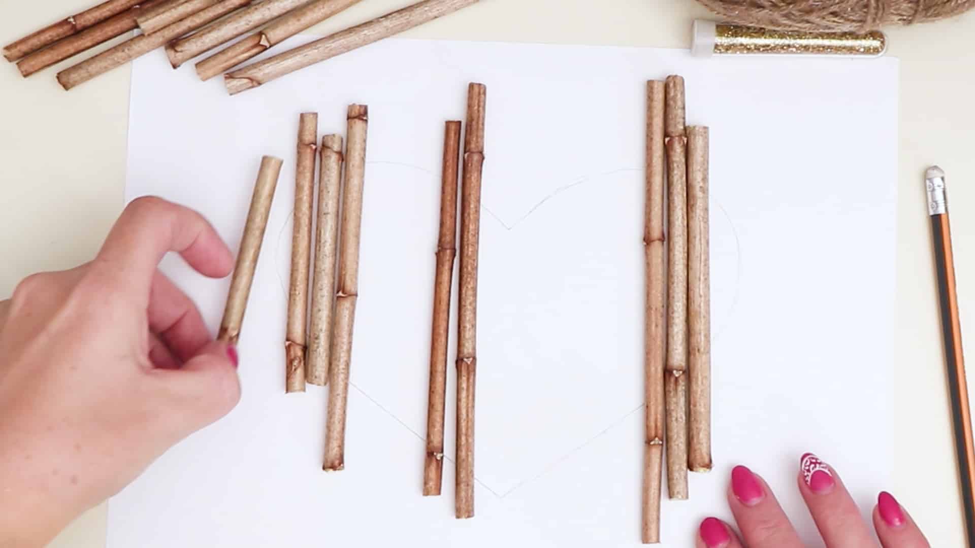 Diy hanging twig heart stick