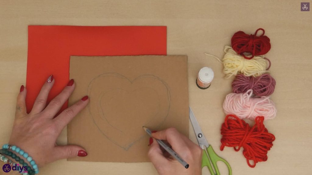Diy yarn wrapped paper heart drawing
