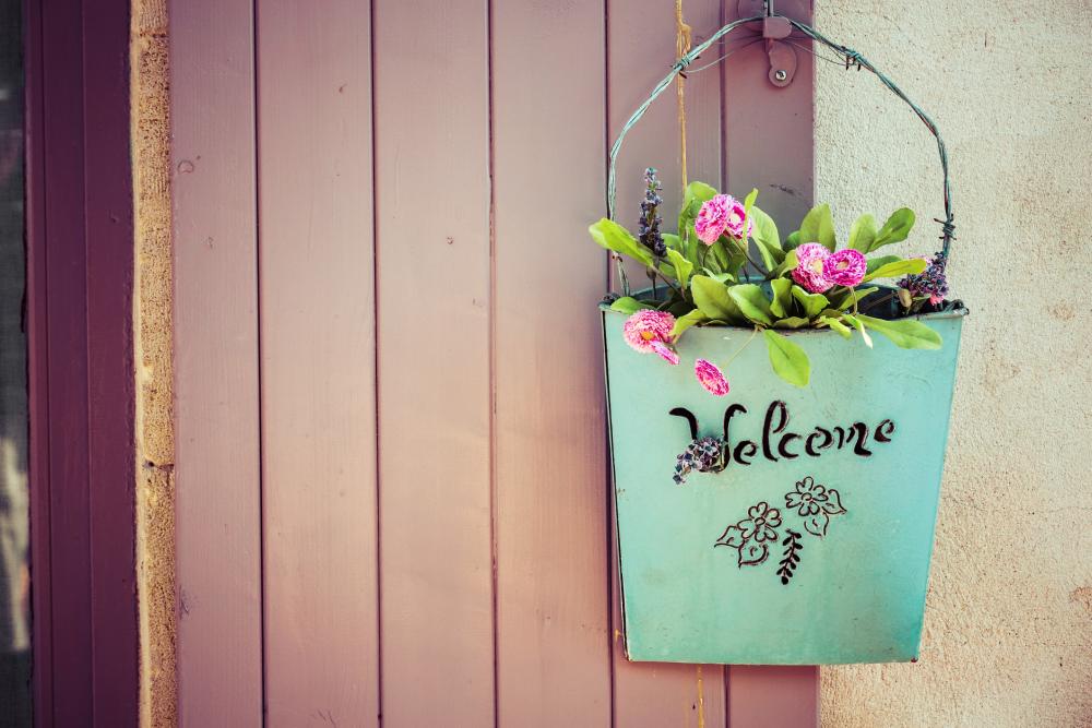 Green basket with flowers welcome porch sign 