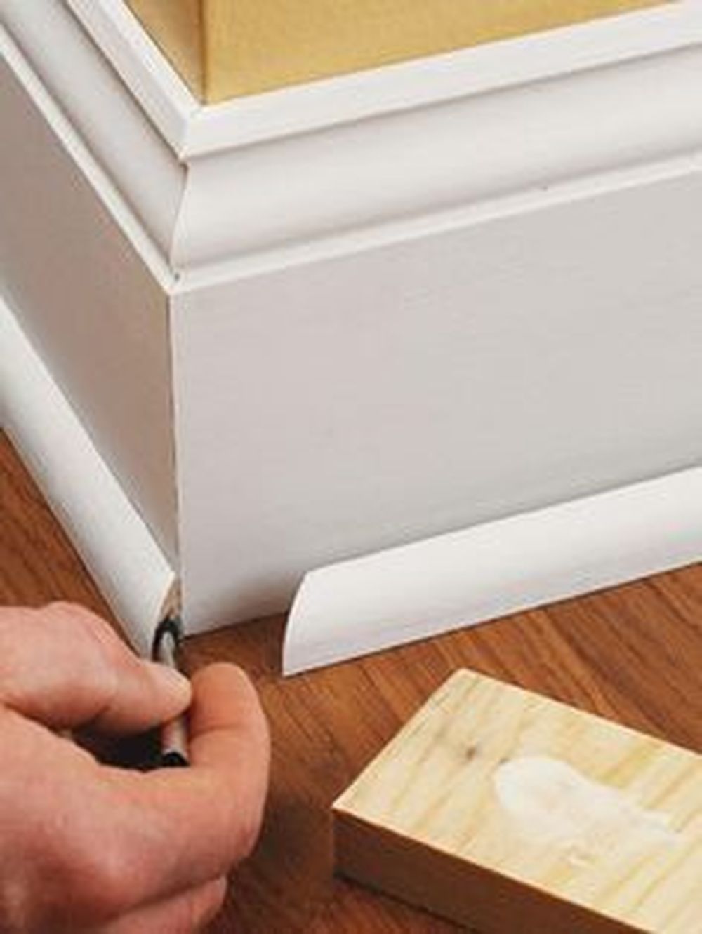 Installing shoe molding adhesive