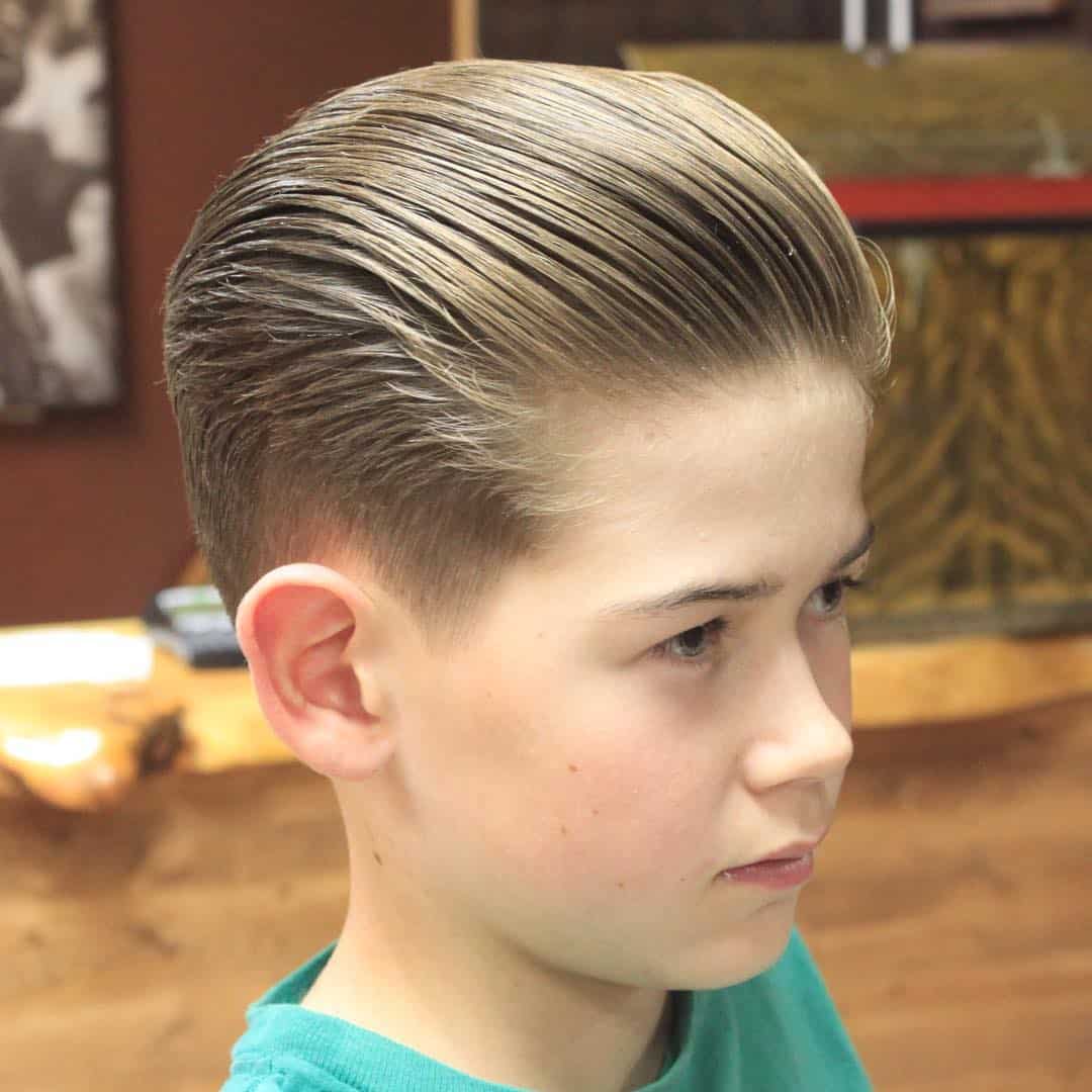 Little boy slicked back vintage haircut