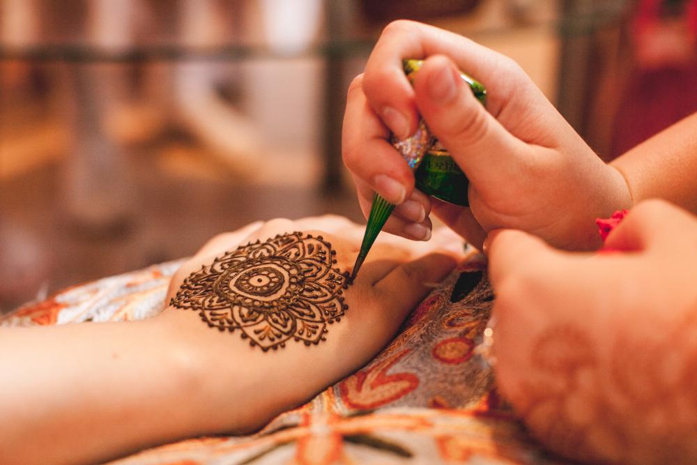Mandala henna hand tattoo