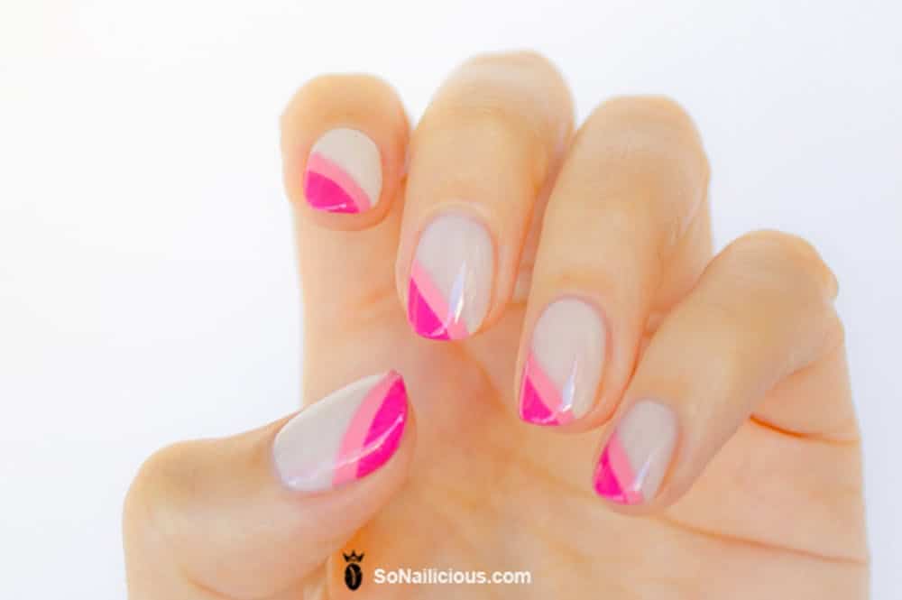 Pink diagnol french tip nail