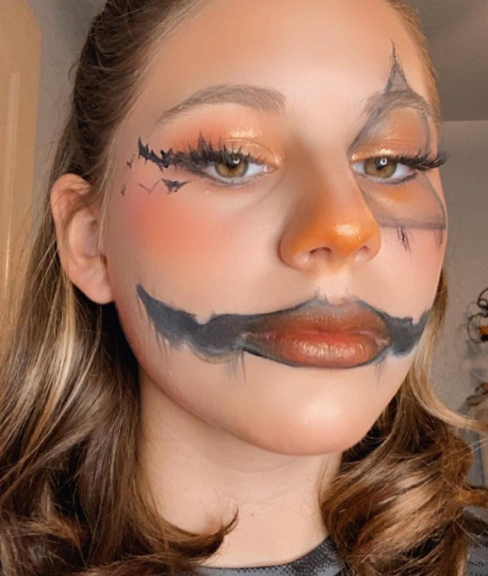 Pumpkin head scary halloween makeup 