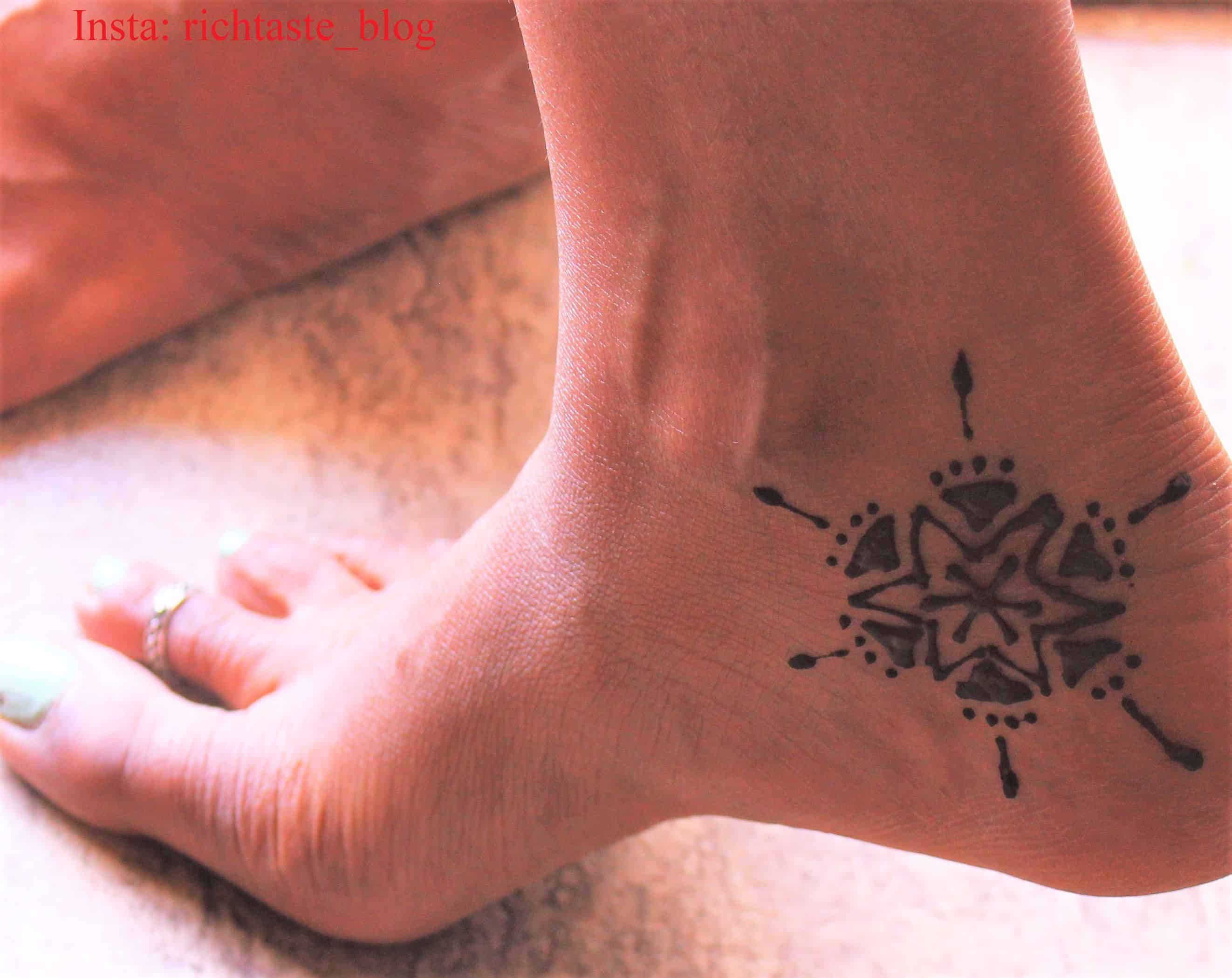 Sunburst inspired inner heel tattoo