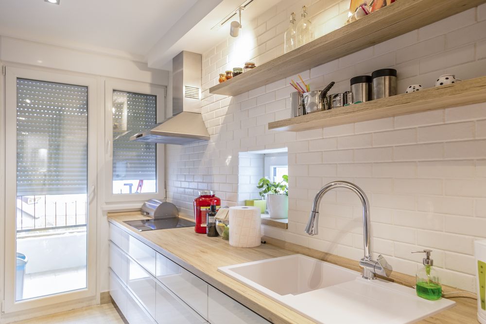 White cabinets with butcher block countertops 