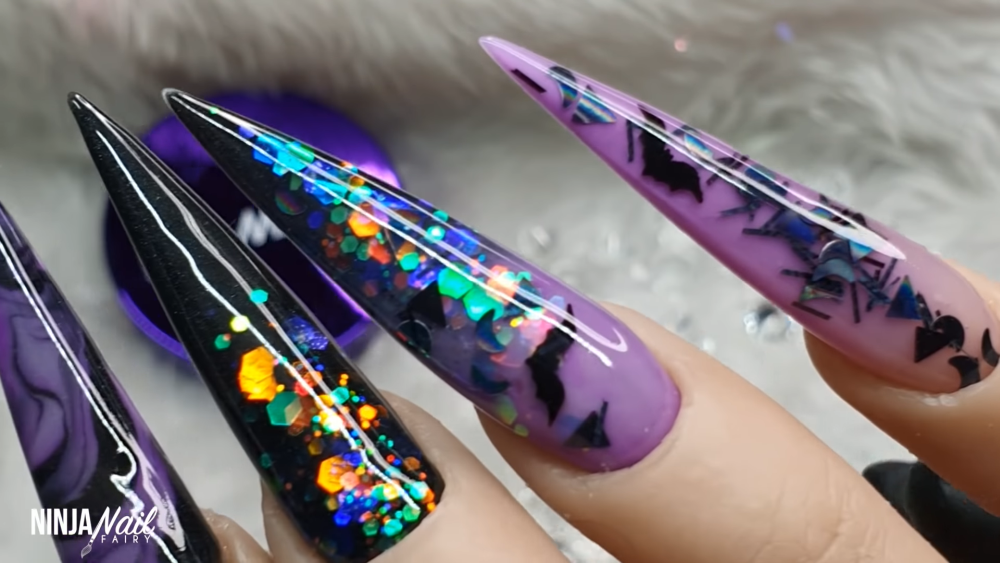 Holographic bats black and purple nails 
